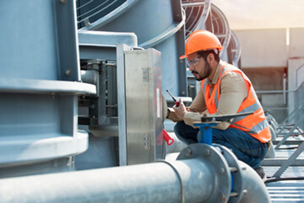 HVAC contractor performing maintenance in Ft. Myers.